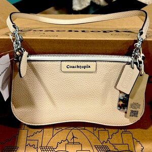 Coachtopia small wavy baguette bag